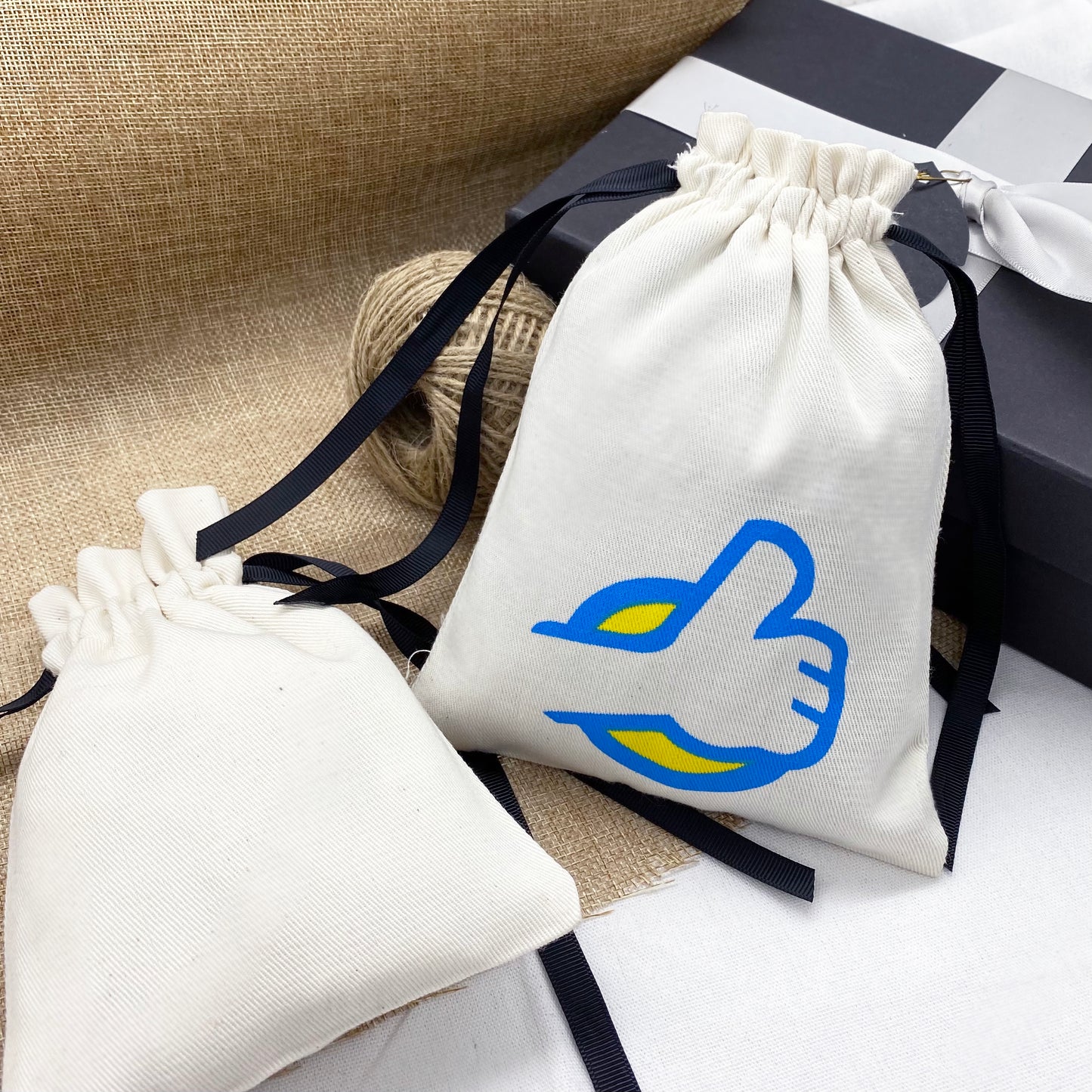 White thick twill cotton pouches, bulk wholesale custom logo bags.